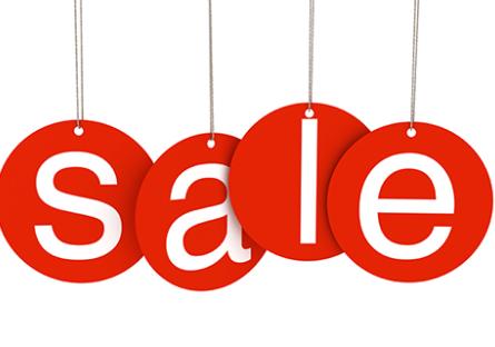 Red hanging sale letter tags, the word "sale" spelled in white.