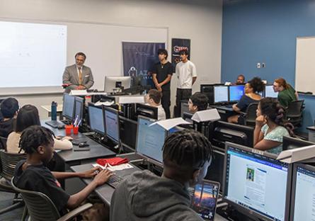 National Cyber Director Harry Coker, Jr., speaking at the Gaucho Security Operations Center (GSOC)