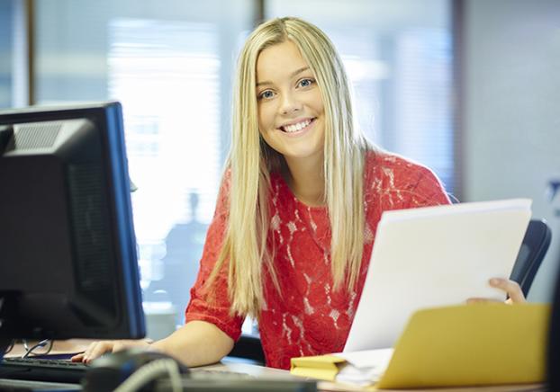 Image of tutor with computer.